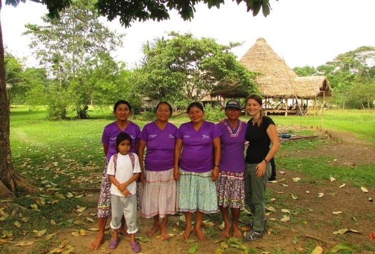 Ashley Blake of Traverse Jouneys in Ecuador with some women of the Sani Warmi project. This community partner empowers local women and protects the rainforest.