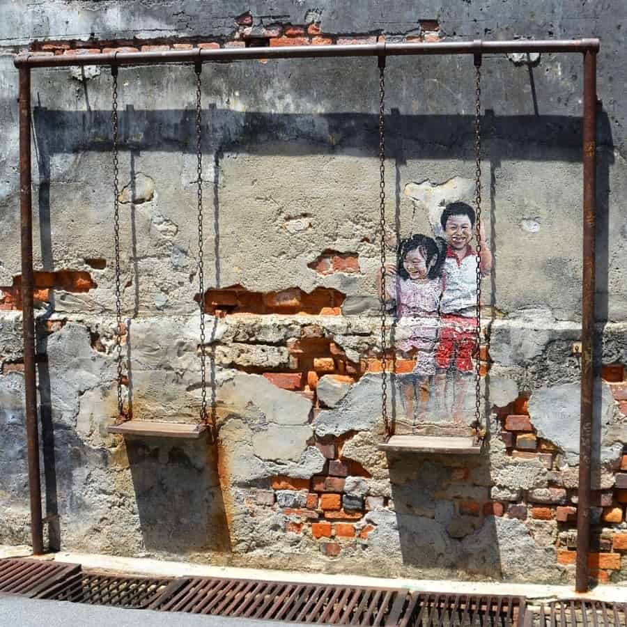 Brother and Sister on a Swing mural in Penang