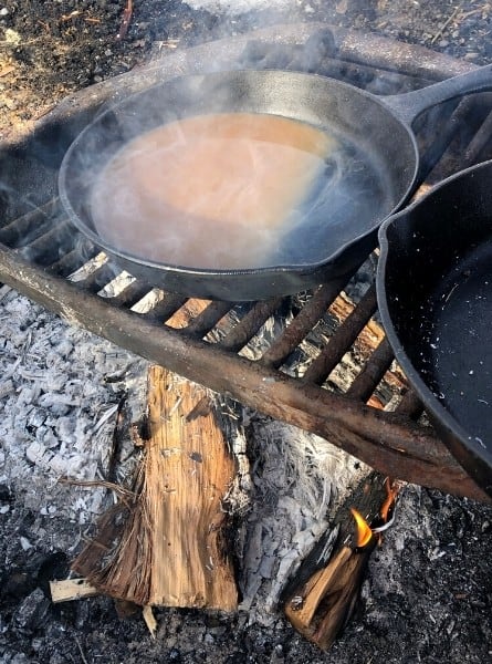 Cast iron pans are ideal for cooking at a yurt campfire