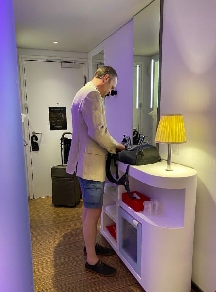 A man stands at the Vanity at the CitizenM Bowery Hotel