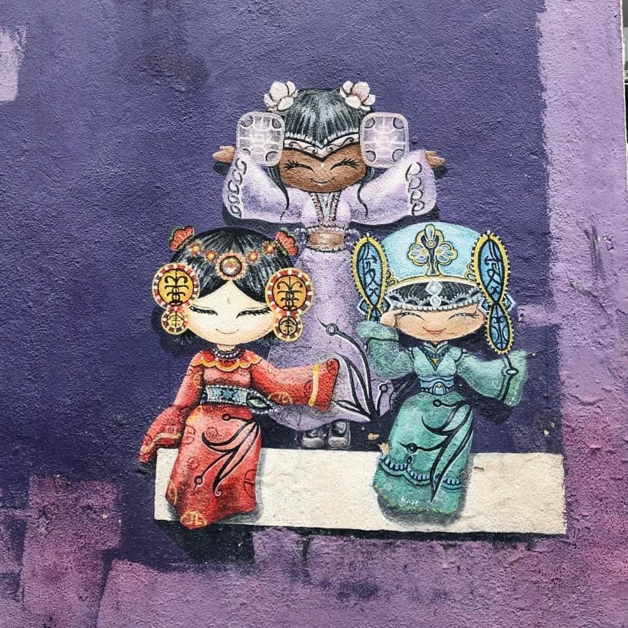 The Wo Ai Nee street mural in Penang depicts three little girls: one Malay, one Indian, one Chinese