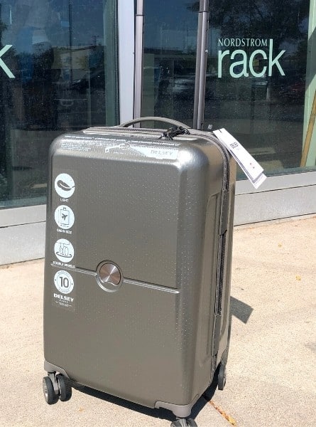 A Delsey Turenne carry-on bag outside of Nordstrom Rack