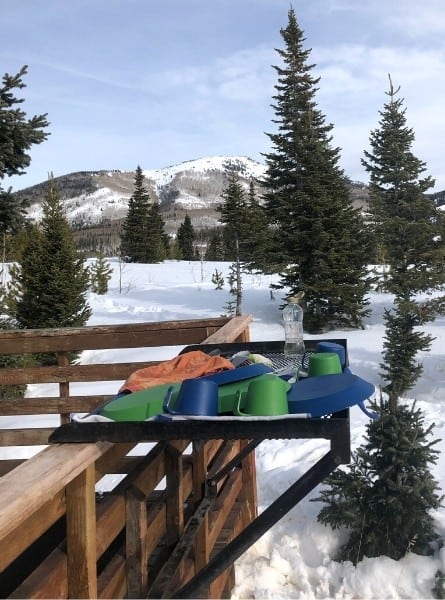 Dishes dry on an outdoor rack at a Pearl Lake State Park yurt