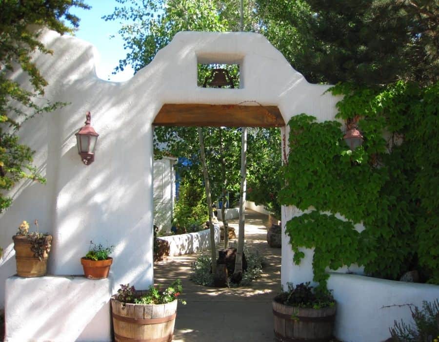 Entrance to El Rey Court, an affordable place to stay on a girls trip to Santa Fe