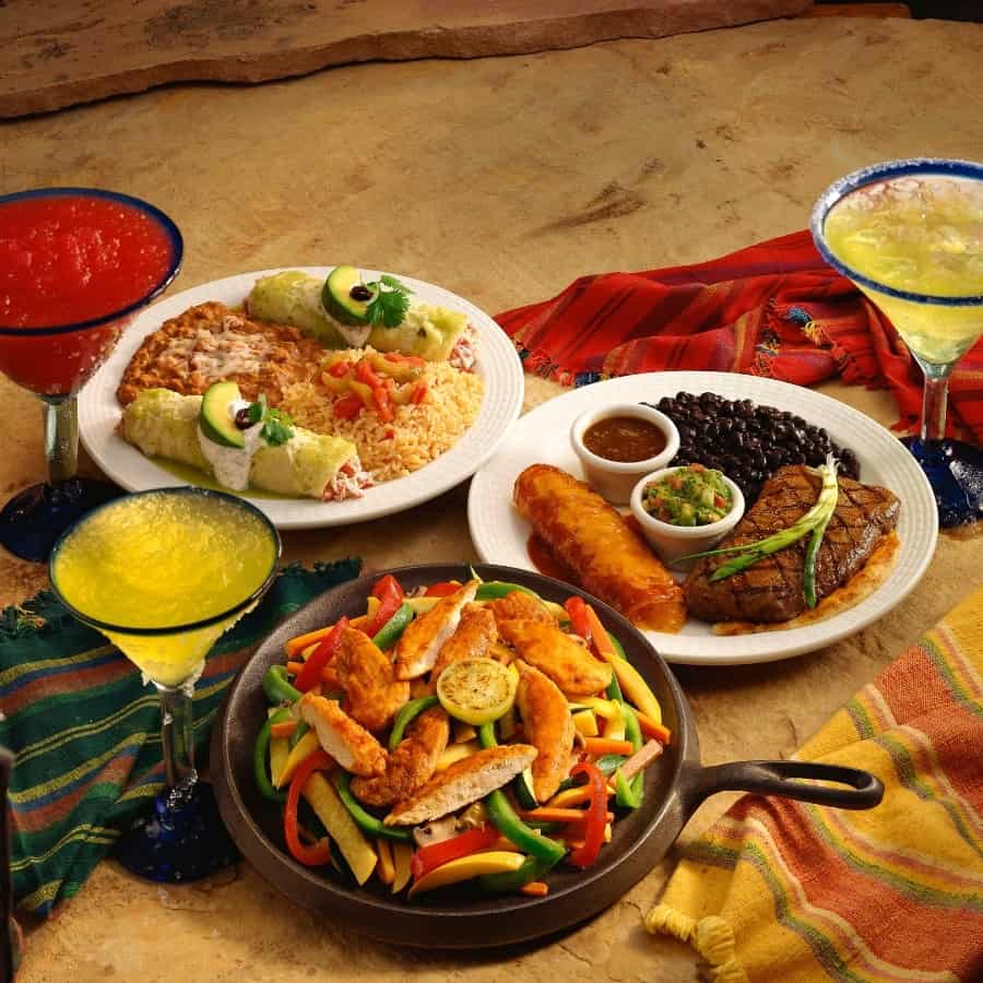 A table is set with an assortment of foods from Southwestern cuisine