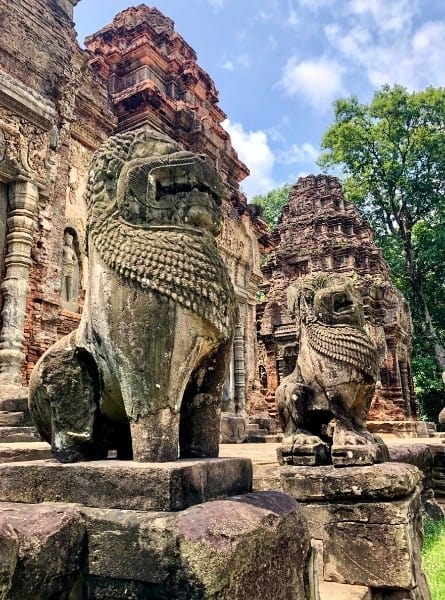 guardian lions at the entrance to Preah Ko Cambodia