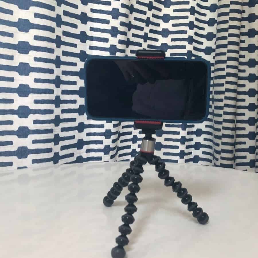 A Joby mini tripod holds a phone ready to take a photo