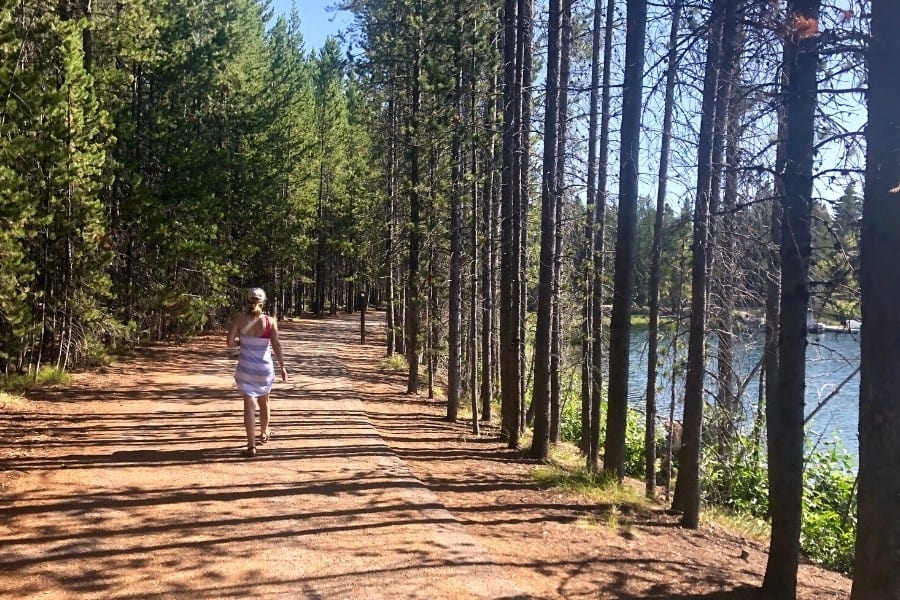 Susan Heinrich walking on Lakeshore Trail at Colter Bay Village
