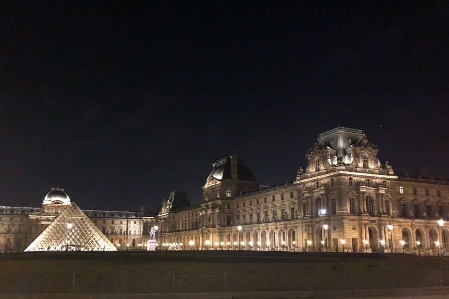 The Louvre Museum Paris illuminated at night
