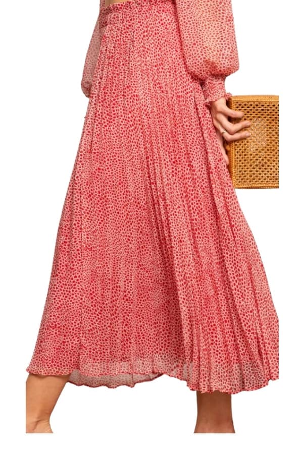 A pink pleated maxi skirt