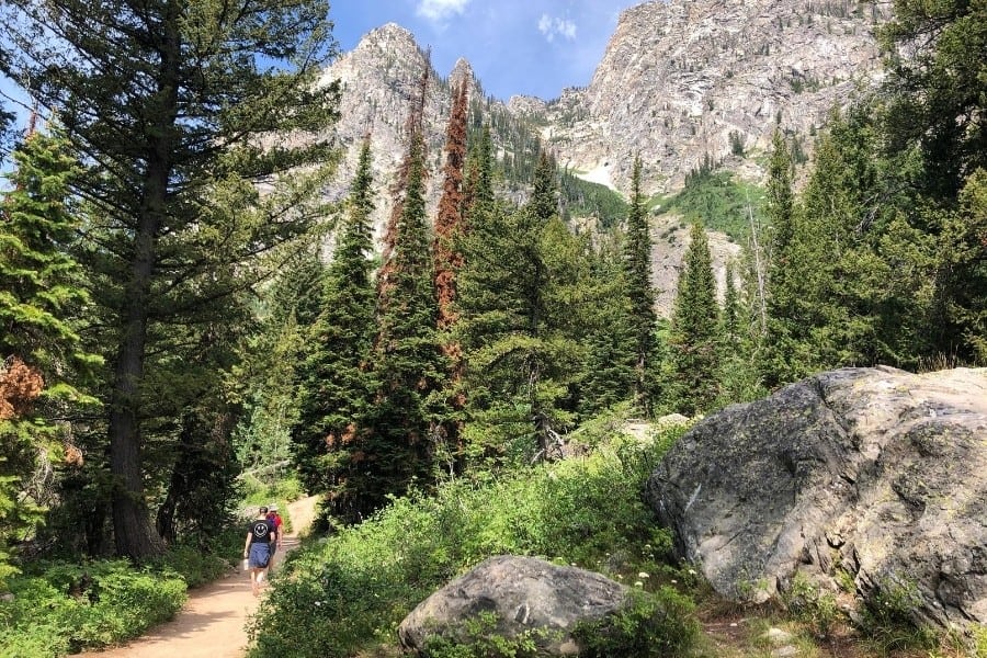 Beautiful photography of hikers in Cascade Canyon, Grand Teton National Park