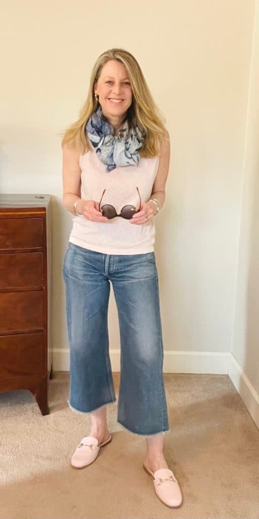 Susan Heinrich wears a cropped jeans and a pink shirt from her spring capsule wardrobe