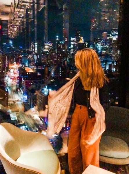 Susan Heinrich looks out the window at the CloudM bar in New York