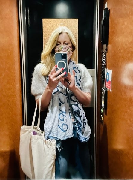 Susan Heinrich in an elevator in Paris