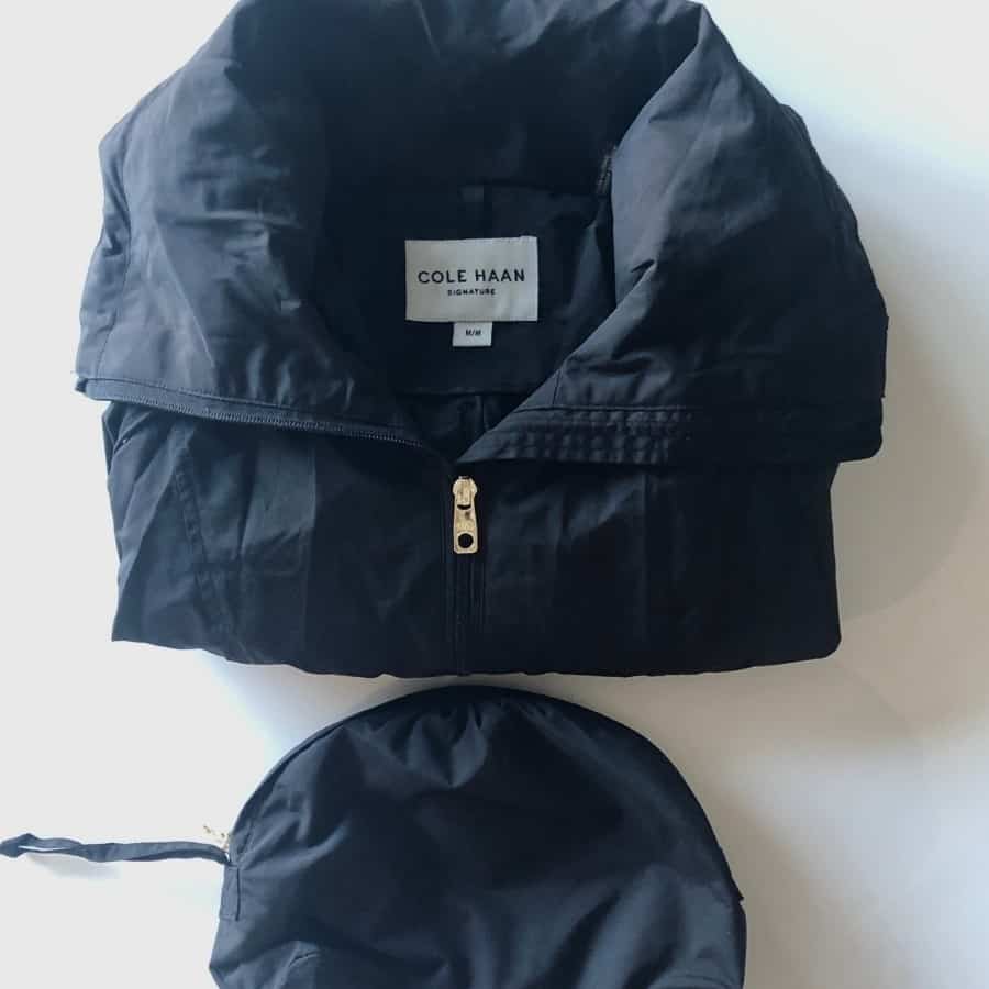 A travel raincoat by Cole Haan packs into a small pouch