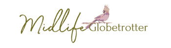 The Midlife Globetrotter logo is green with a pink bird that resembles a parakeet. The word Midlife is in a script font and the word Globetrotter is in a serif font and has a pink bird perched on the first three letters.